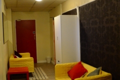 kitchen corredor transformed into a comfotable lounge.