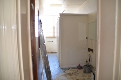 toilettes area with cubicles at the centre of room to be change.